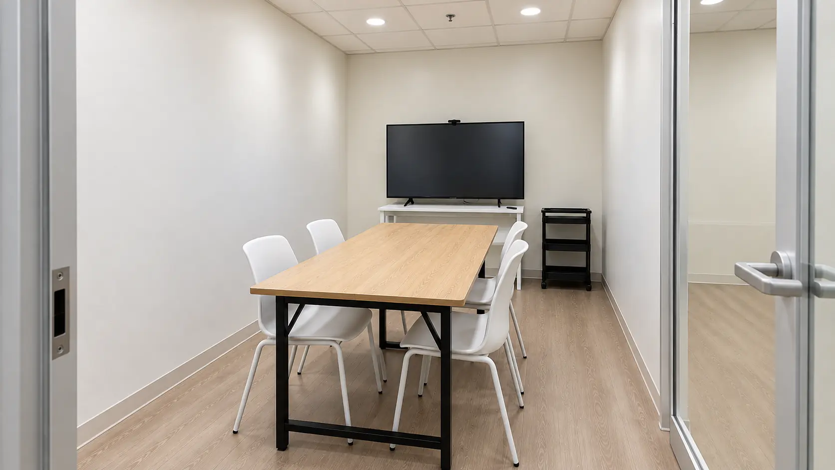 TSA group classroom with a shared table and a display screen